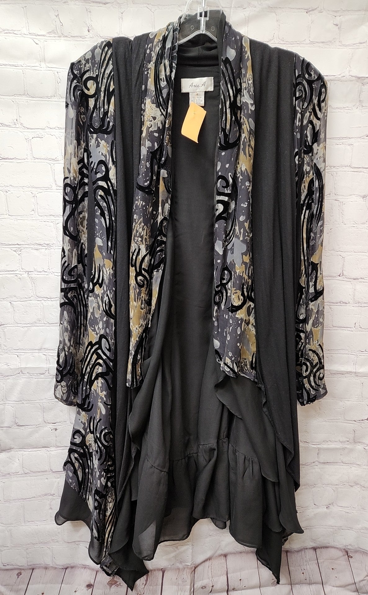 Aris. A Women's Size M Black Cardigan